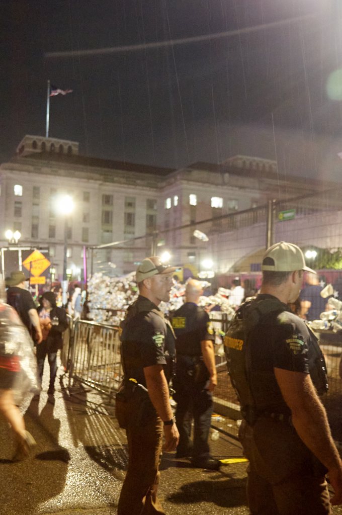 Border Patrol agent and state troopers in the rain