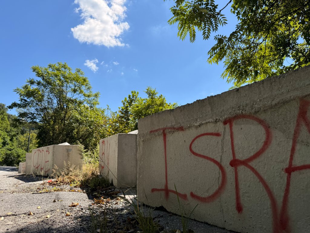 Barrier with red letters ISRA